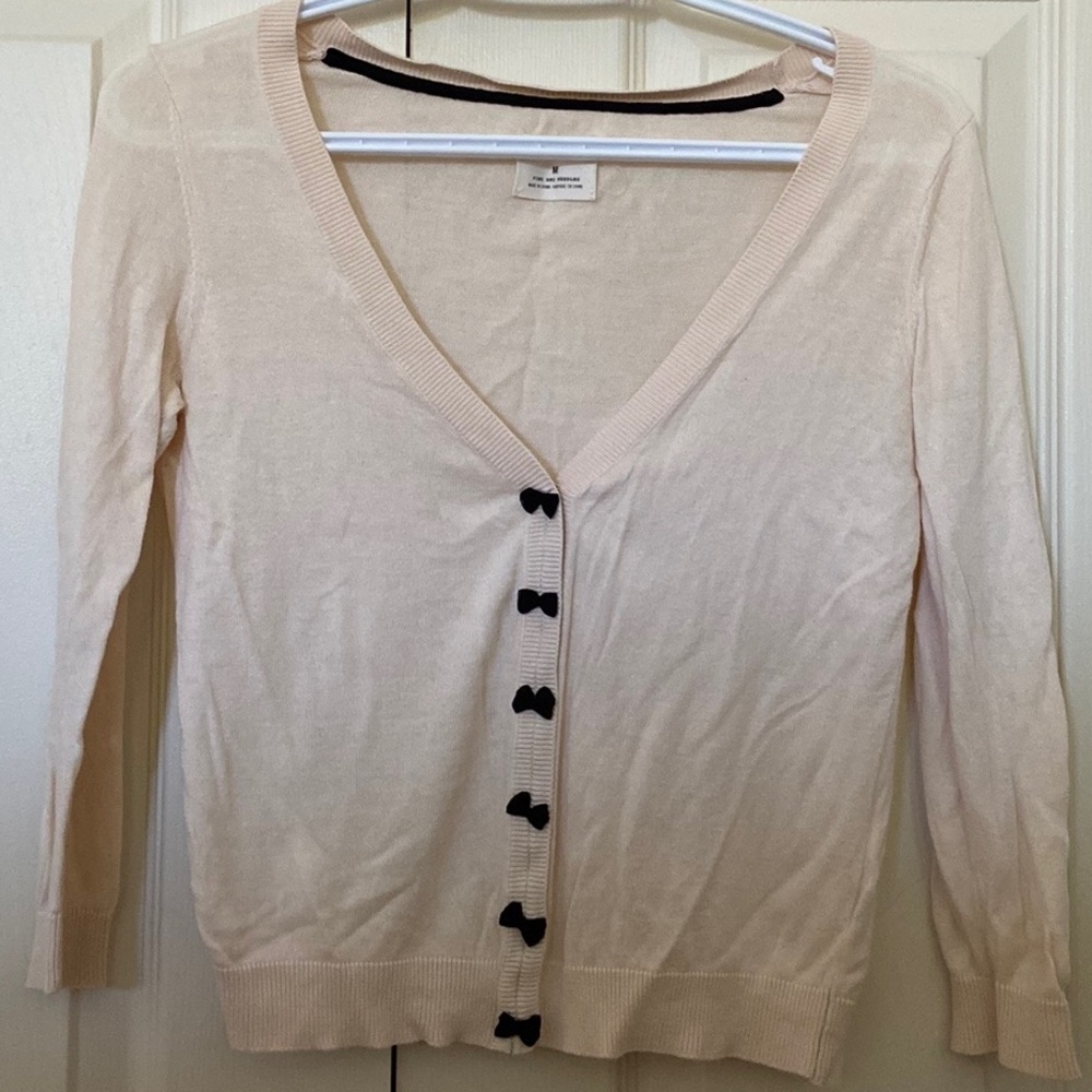 Cream button up cardigan with bows